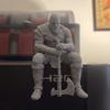 A Unique Muscular Nordic Warrior Pedestal Sitting Statue, and a 3D-Printed Melancholic Bearded Axe-Holding Statue
