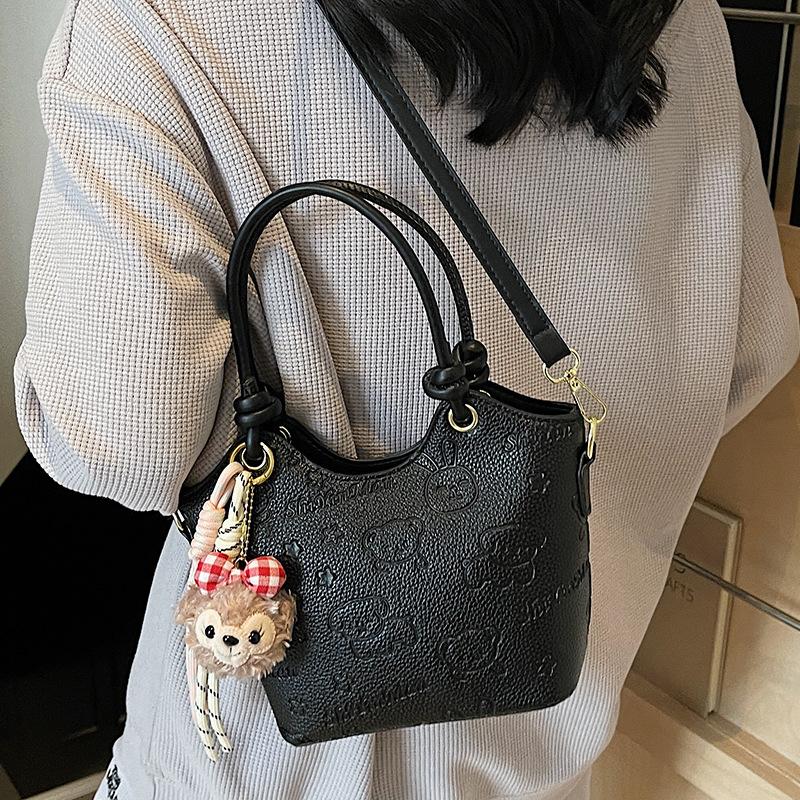 2025 new casual niche cute print high-end portable bucket bag fashionable women's commuter style messenger bag