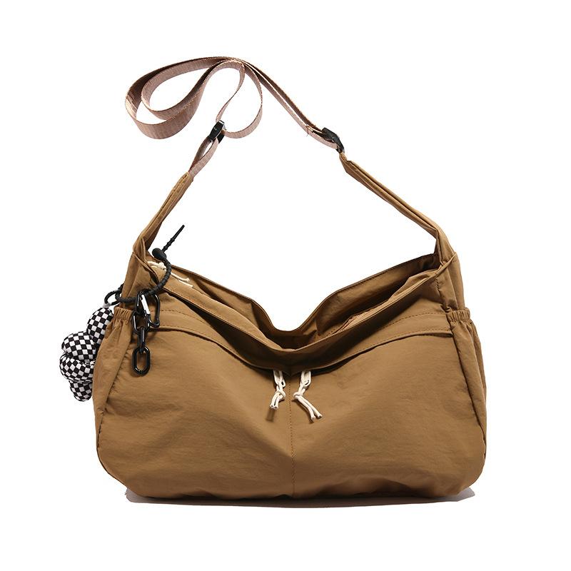 

Simple casual messenger bag New lightweight travel shoulder bag College student commute class bag single package