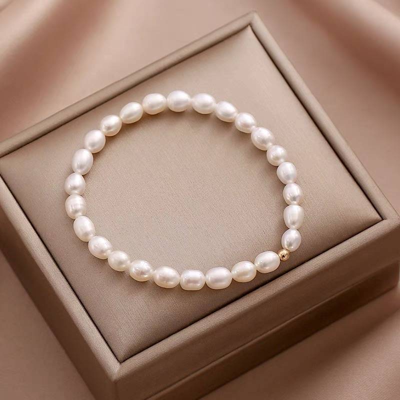 Rice Grain Freshwater Pearl Bracelet Temperament Niche Design Fashionable And Simple 18K Gold Electroplating Bracelet Elastic Adjustable