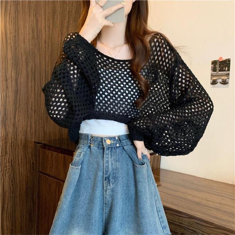 

Летний новый вязаный свитер короткая блузка ажурный однотонный свободный свитер с круглым вырезом топ Average code 52-232 чёрный