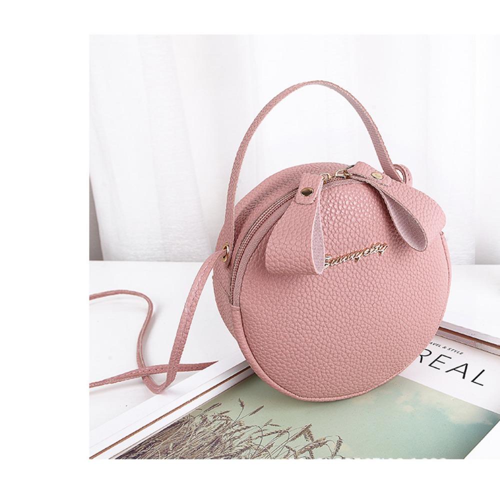 

Маленькая круглая сумка с узором личи Маленькая свежая женская сумка розовый