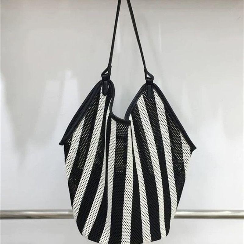 

Niche Hollow Woven Bag Women 2025 New Large Capacity Tote Bag Idle Style Shoulder Bag Portable Shopping Bag Black