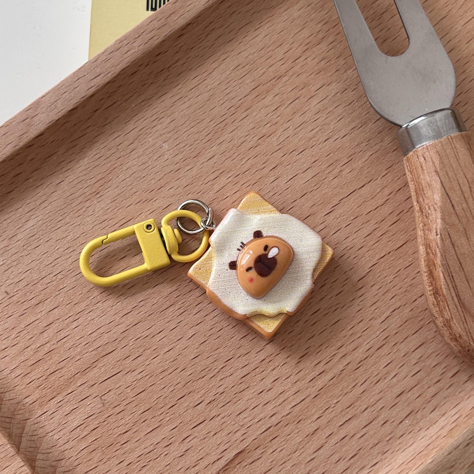 

Брелок Капибара Сырный Тост: Милая игрушка в виде еды и шарм в подарок для друзей