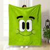 A Smiling Green Cartoon Face with Large Eyes and Expressive Eyebrows. for All Seasons Blanket Lunch Break Throw Gift
