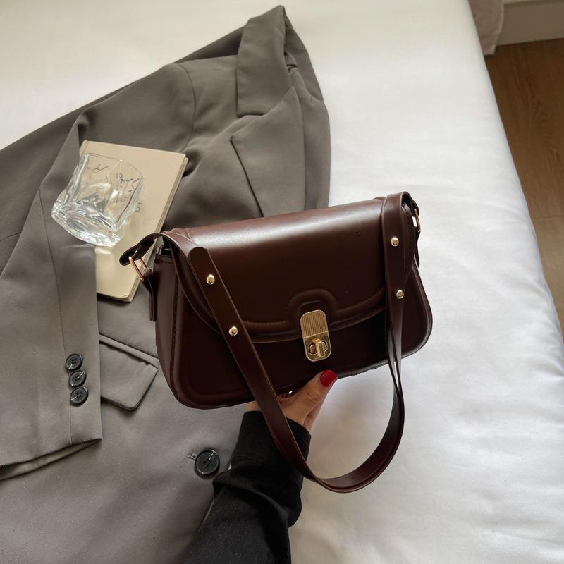 

Spring and summer new women s bags niche style lock small square bag shoulder messenger bag to create a sense of trend and high-end темно-коричневого кольору