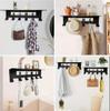 Wandmontierte schwarze Metall-Garderobe mit Regal und 6 Haken