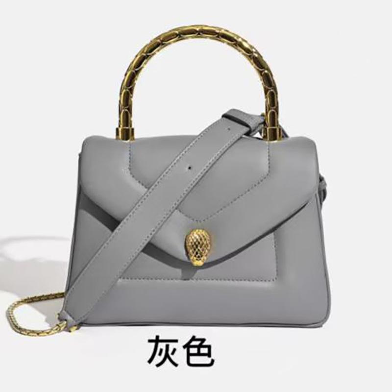 New leather women's bags, high-end cowhide bags, fashionable and versatile snake head portable messenger bags