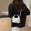 Hand carrying bucket bag women 2025 new Korean version ins trendy fashion shoulder bag simple niche messenger bag