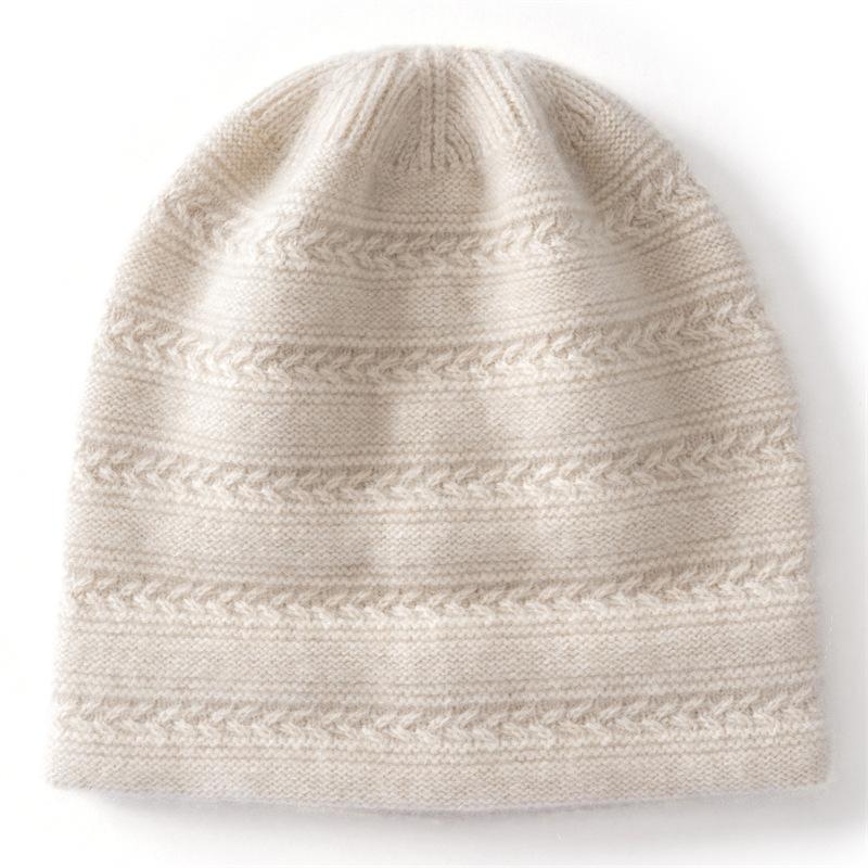 Soft waxy cashmere, autumn and winter new women's solid color jacquard crimped headhat, warm ear protection knitted hat