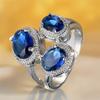 Süße Damen blaue Zirkonstein Silberfarbe Hochzeit Versprechen Verlobung Weizenringe für Frauen