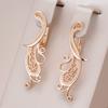 Neuer Trend Roségold Glänzend Lange Ohrringe Frauen Kreative Mode Party Schmuck Einfache Hohle Blume Hängeohrringe