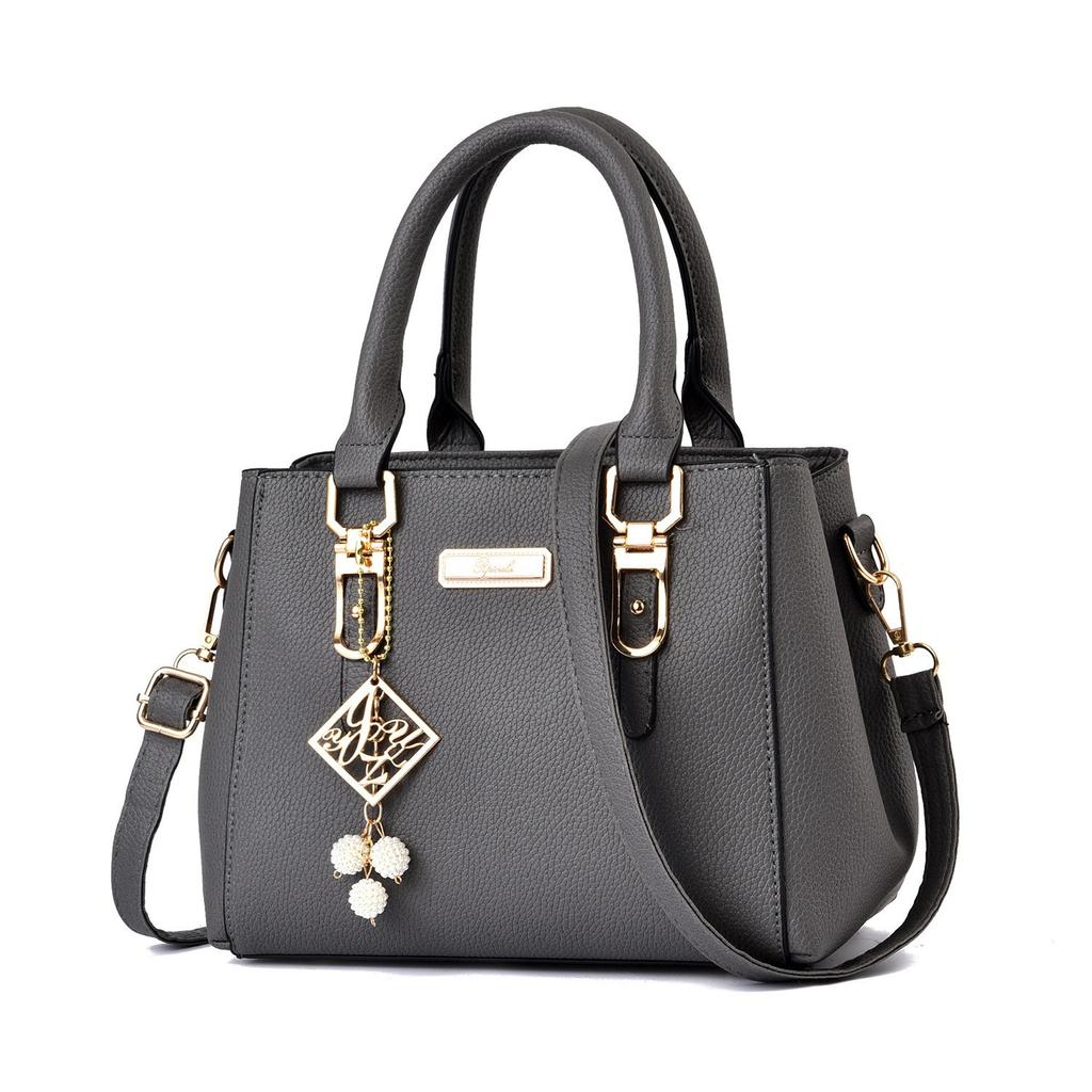 Fashion versatile women's handbag simple large-capacity messenger bag double-layer hairball shoulder bag bags