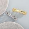 Grillz Hollow Borchiati di Diamanti Europa & America: Gioielli per Denti Placcati Oro e Argento