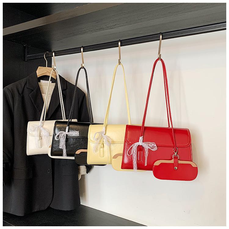 Simple and versatile bag women's large capacity 2025 new summer shoulder armpit bag casual texture commuter tote bag