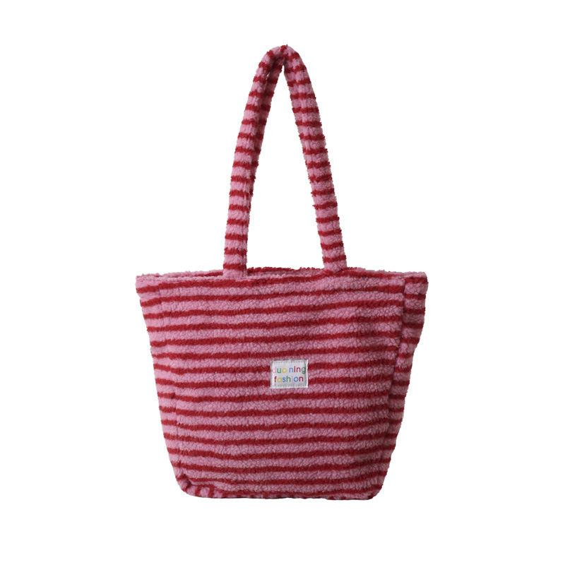 

Striped plush bag women s 2024 new trendy college style tote bag large-capacity textured portable lamb wool bag рожевий