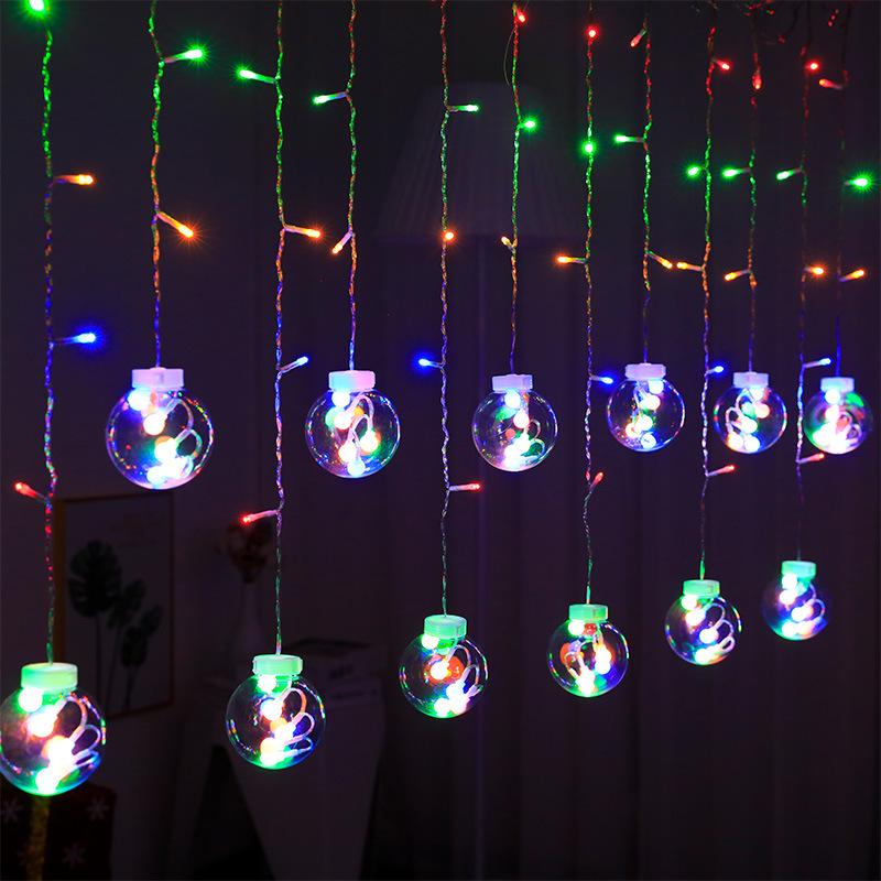 Twinkling LED Curtain Lights with Wishing Ball, Star, and Bell Accents for Christmas and Birthday Decor