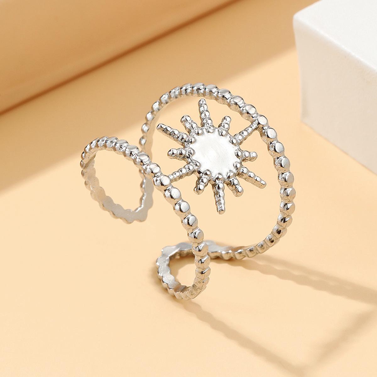 Adjustable Titanium Steel Hollow Sunflower Ring - Exotic Ethnic Style for Women