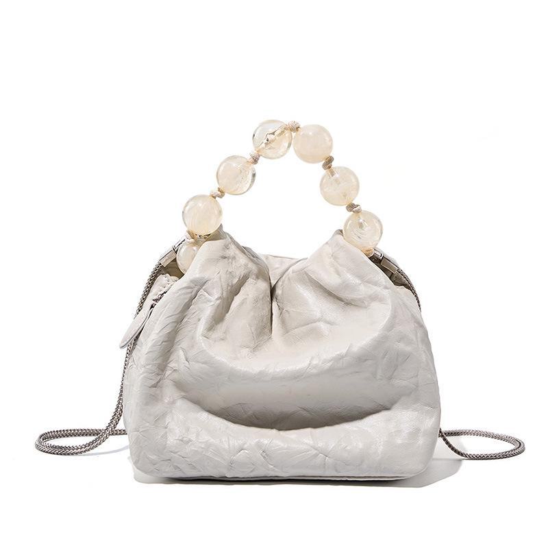 Elegant Chinese Style Beaded Cowhide Handbag - Unique Hand-Scratched Pattern, Perfect as a Lunch Box or Clutch.
