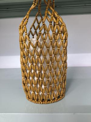 Borsa a tracolla da donna in perline di legno traforate, lavorata a maglia a mano