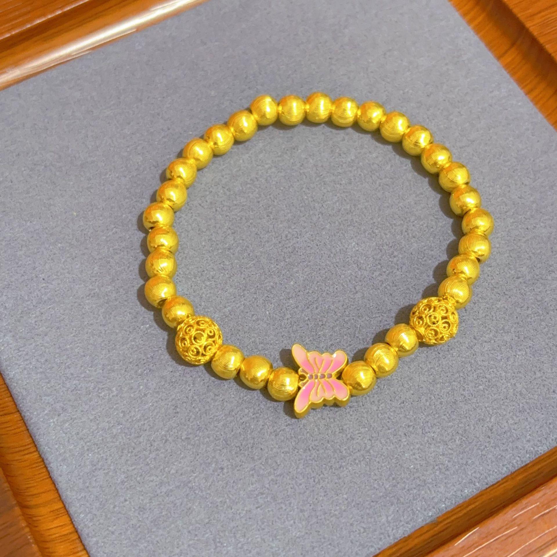 

Gold-Plated Butterfly Cat s Eye Enamel Bracelet with Ancient-Style Lucky Beads