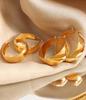 European-American Vintage Asymmetrical Round Titanium Steel Earrings for Women