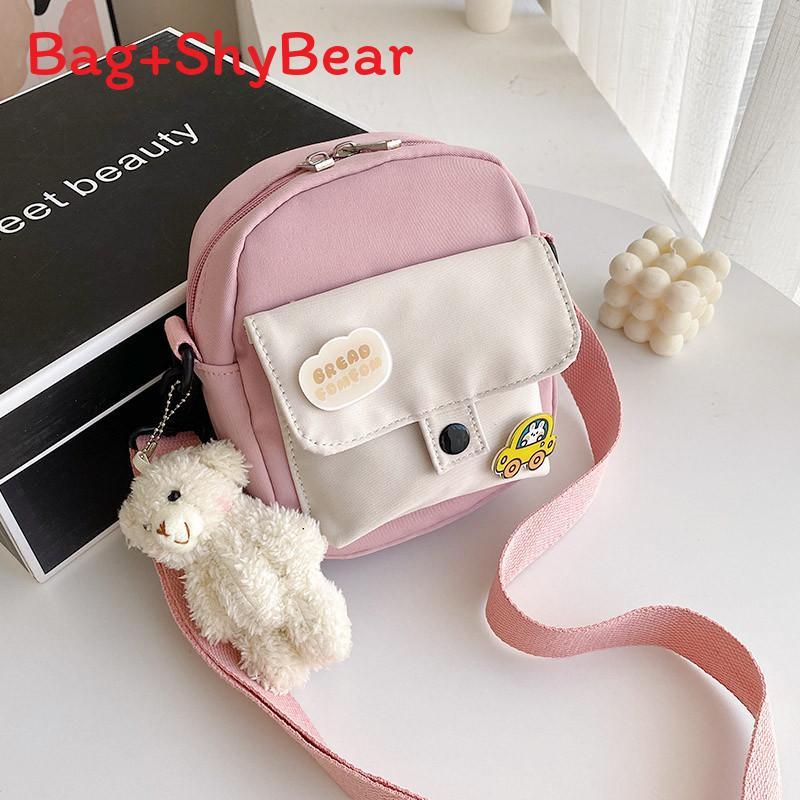 Piccola borsa a tracolla da donna in tela con tasca per cellulare e design a blocchi di colore, ideale per l'uso quotidiano.