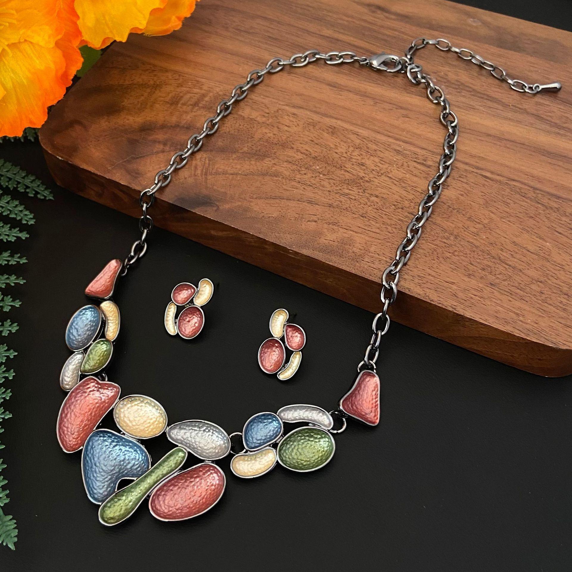 

Цветная масляная живопись Геометрический лепесток Черненое колье и серьги Набор Мода Женский Премиум Лепесток Аксессуары