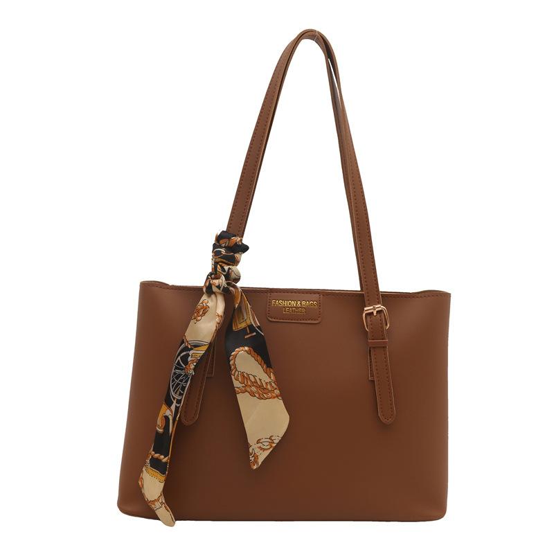 

Large-capacity bag women s autumn and winter versatile 2025 new simple shoulder bag college student class bag commuter tote bag светло-коричневого