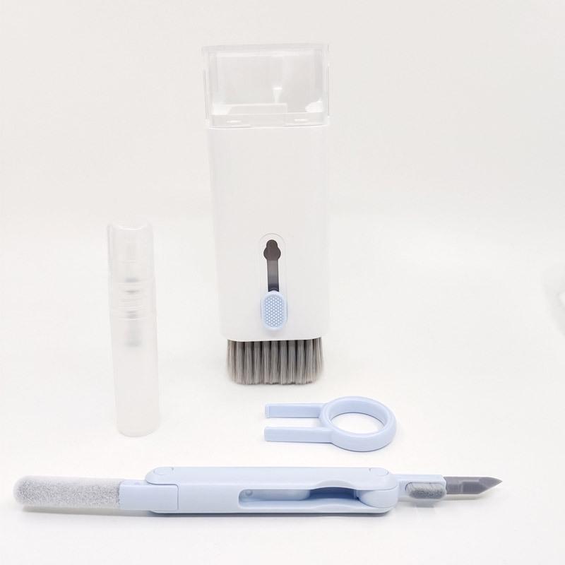 Q6E7 7-in-1 Multifunctional Cleaning Tool Set: Keyboard, Earphone, and Phone Dust Remover.