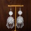 Miao Silver Tassel Earrings: Ethnic Style, Fashionable Exaggeration, Light Luxury Design