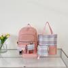 New schoolbag, primary school girl, lightweight stress relief, student backpack, fashionable plaid backpack, four-piece set