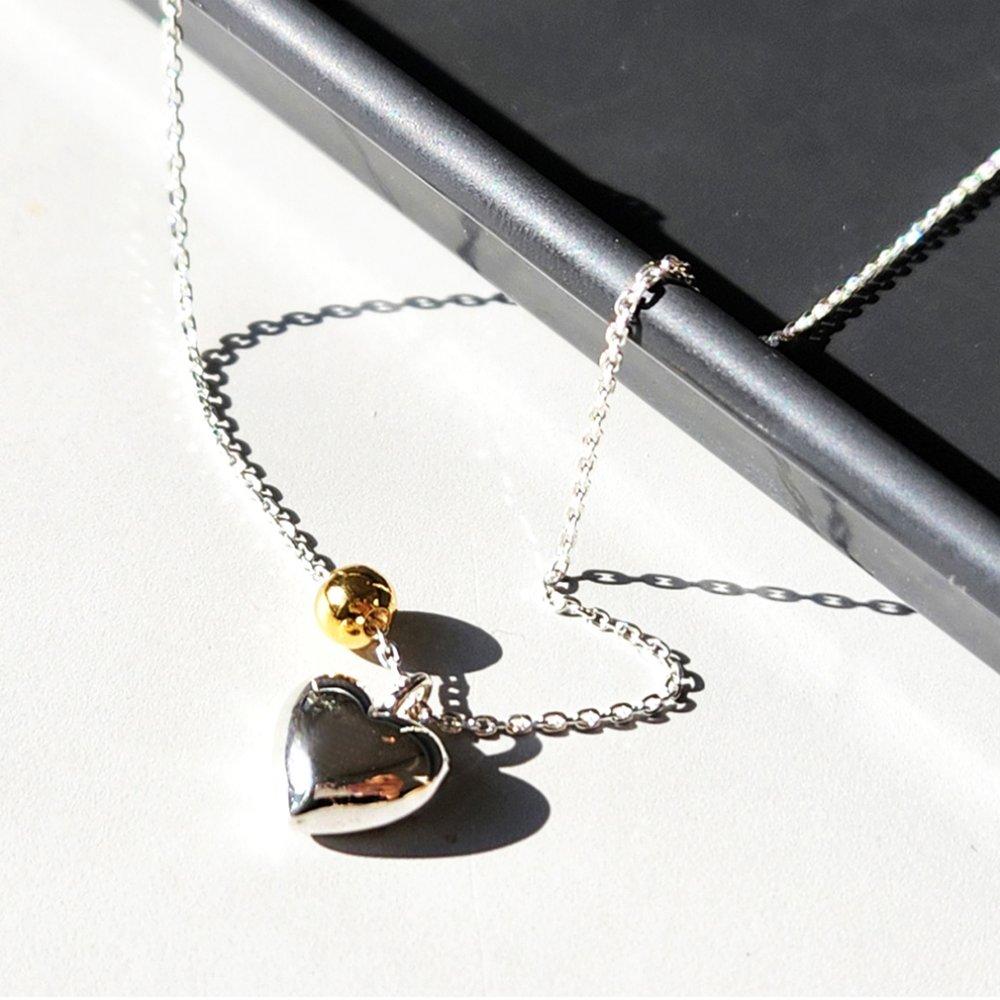 Two-tone Silver Necklace with a Heart Ball