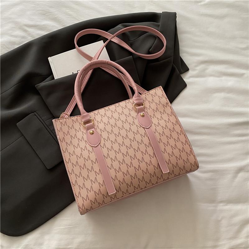 

Bags Large-capacity women s autumn new trendy niche shoulder bags Versatile portable commuter tote bags розовый
