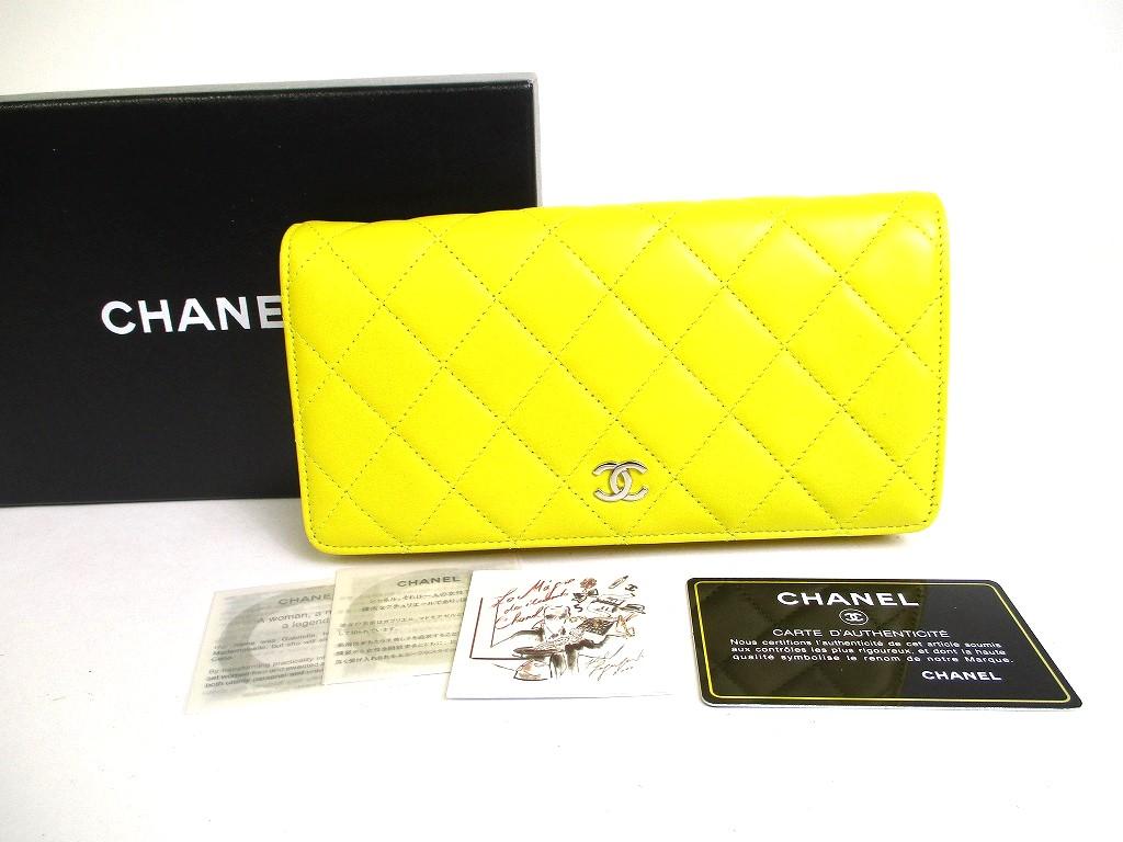 

Автентичний довгий гаманець CHANEL з жовтої шкіри ягняти №a368 відновлений