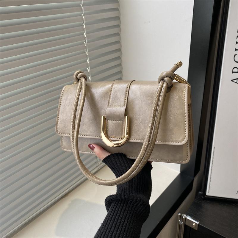 

French niche design retro underarm bag women s 2025 autumn and winter new high-end texture shoulder portable small square bag хаки