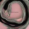 eenie beenie angora soft heart tie necklace