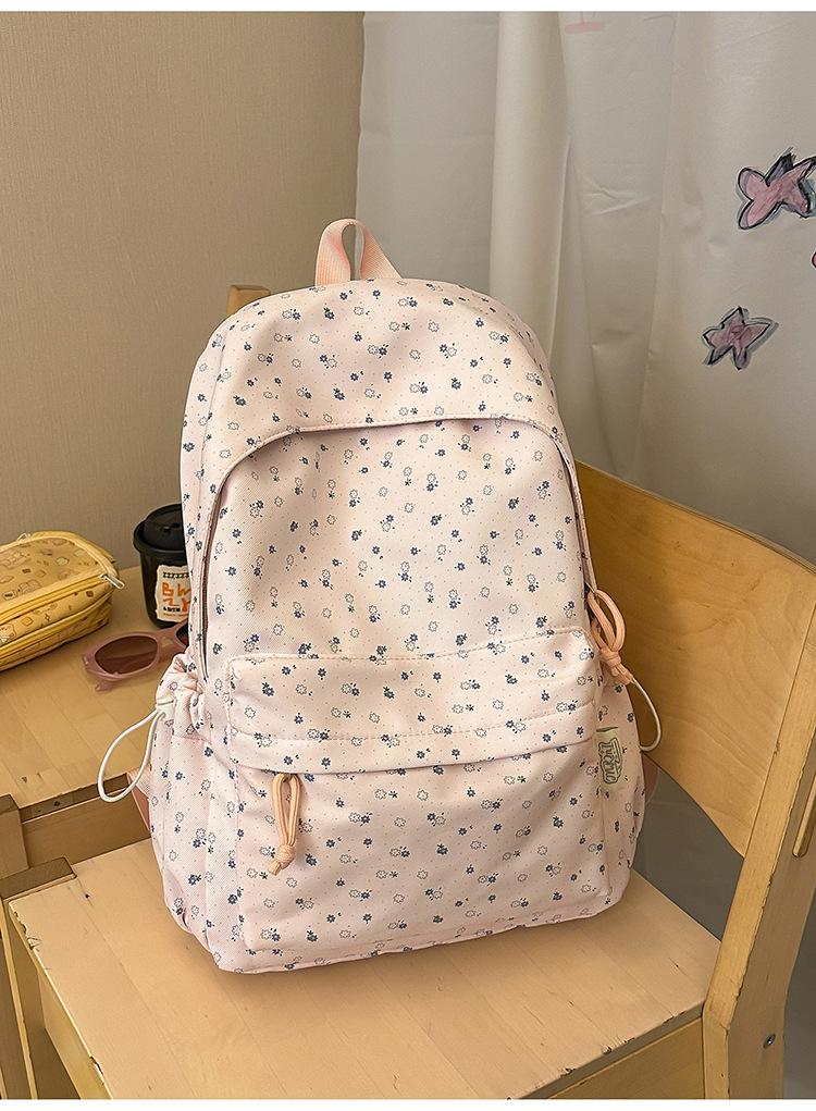 Schulrucksack große Kapazität Schulrucksack Mittelschule Oberschule Schüler Freizeit neue Version Koreanischer kleiner floraler Rucksack Studenten Reise
