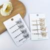 A Pack of 4 Hollow Butterfly Hairpins, Each Measuring 2.56 Inch