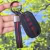 Pokrowiec na kluczyk do Peugeot 3008 5008 208 301 308 C1 C2 C3 z breloczkiem Odporna na zarysowania powierzchnia Wstrząsoodporna konstrukcja Miękka tekstura uchwytu