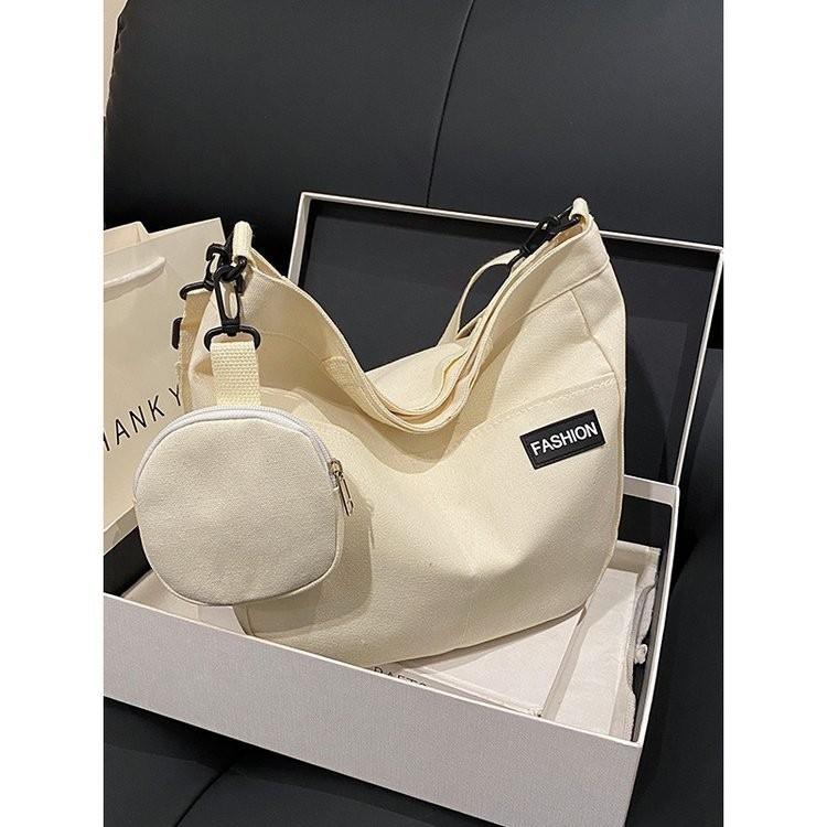 

Стильная вместительная холщовая сумка-тоут для женщин в шикарных белом, хаки и черном цветах белый