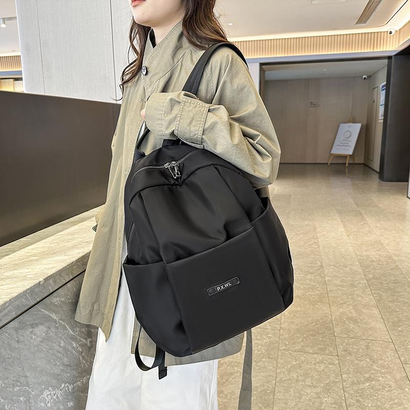 Schoolbag1011 New Simple Design Backpack Large Capacity Junior High School School Bag Commuter Lightweight Waterproof Travel Backpack
