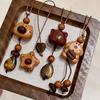 Tiger Eye Wooden Little Bear Dog Necklace: Women's Cute Beaded Sweater Chain for Autumn/Winter.