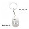 Pendentif Porte-clés 26 Lettres en Acier Inoxydable Creux - Polyvalent pour Sac à Dos, Voiture, Plaque Militaire