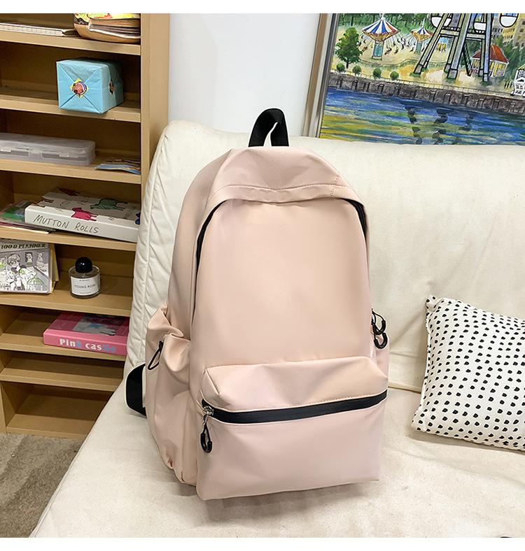 School bag solid color letter fashion backpack Korean version college student lightweight school bag outdoor travel large capacity backpack