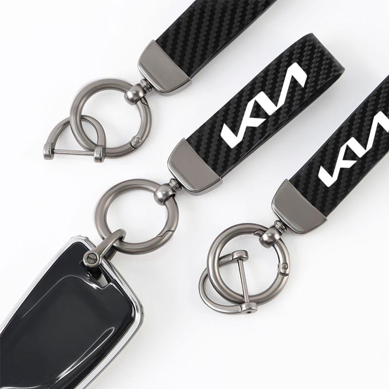 JNGO1 Brelok do kluczy samochodowych Logo Włókno węglowe Skóra Stop cynku Odznaka dla Kia Sportage Ceed Picanto Rio ProCeed Niro 5 3 4 K7 K5 K8 K3 Ray K9