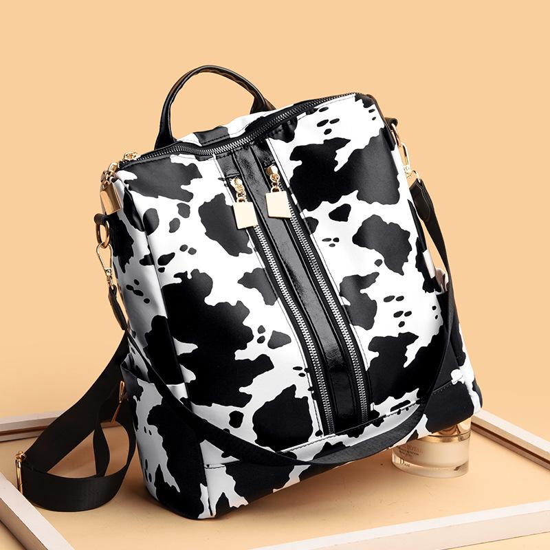 New backpack, fashionable retro backpack, large-capacity commuter women's bag, cow leopard print, high-end textured shoulder bag.