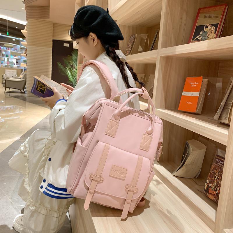 Stylish Mommy Bag: Hand-held Baby & Mother Backpack for Light Travel