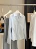 2026 Spring Women's Elegant V-Neck Lace Trim Long-Sleeve Shirt with Tie-Up Waist and Irregular Hem.
