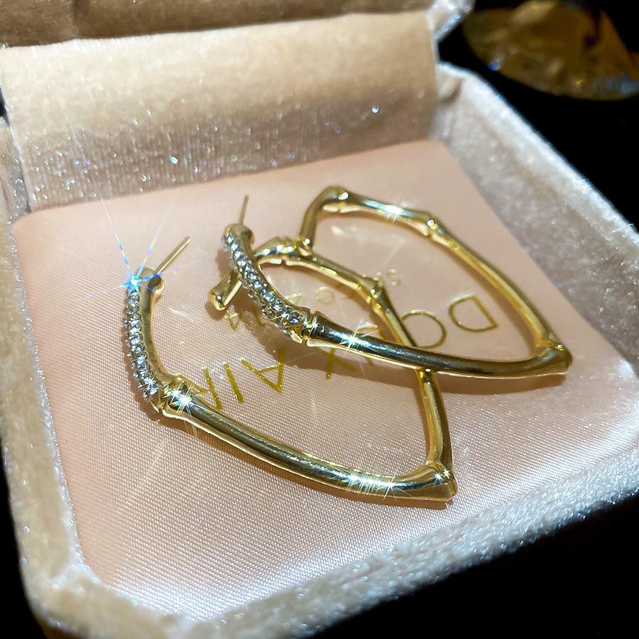 Diamond bamboo curved stud earrings light luxury niche earrings exaggerated earrings women